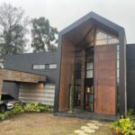 New, Two Level Gated Envigado Home With High Ceilings, Modern Design, Interior Stonework & Gardens, Island Kitchen & High-End Appliances