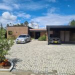 Like-New 4 BR Gated Community Home in Llano Grande With Modern Design, Backyard Terrace, and Low Taxes