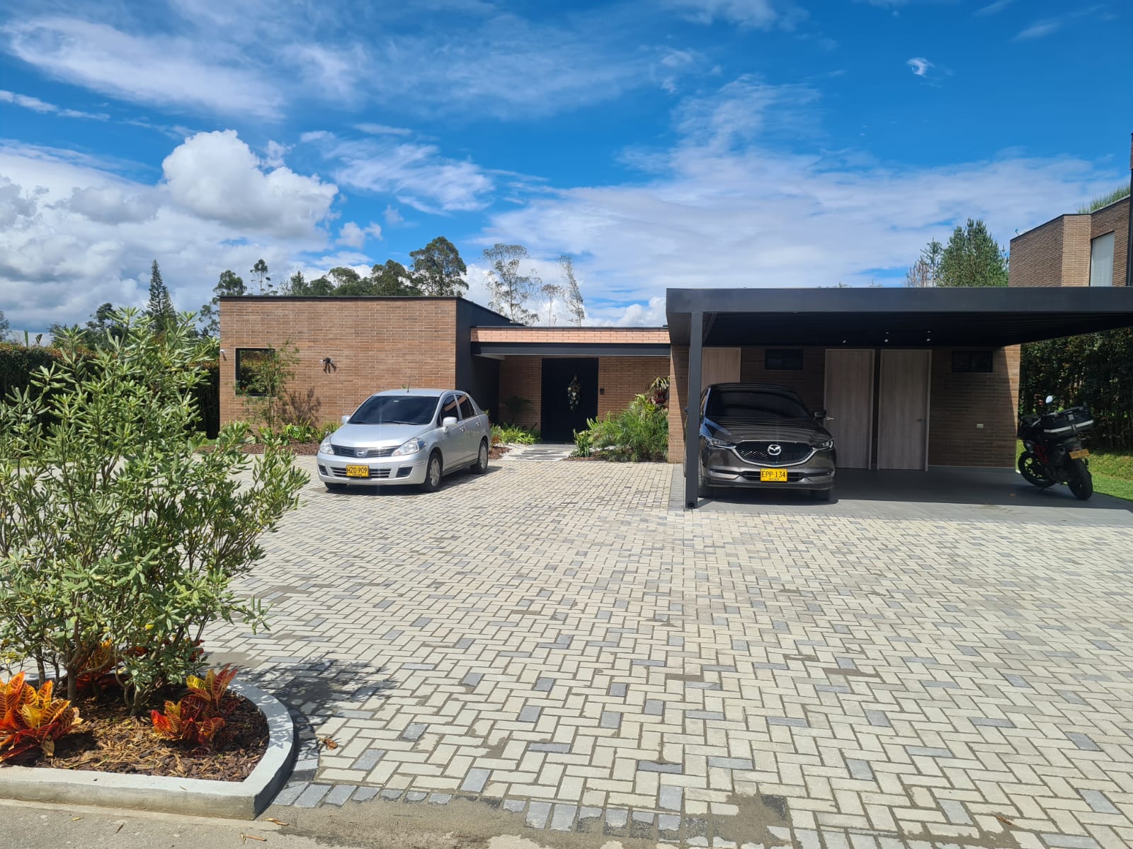 Like-New 4 BR Gated Community Home in Llano Grande With Modern Design, Backyard Terrace, and Low Taxes
