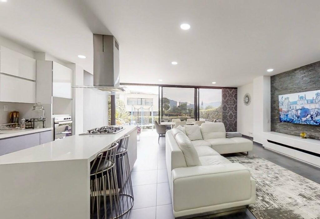 Like-New 3BR Envigado Condo With Backyard Patio, Air Conditioning, and Four Parking Spaces