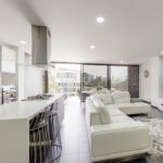 Like-New 3BR Envigado Condo With Backyard Patio, Air Conditioning, and Four Parking Spaces