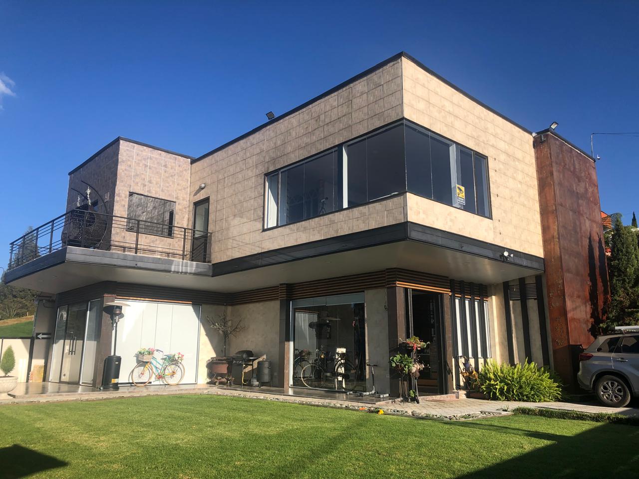 Fairly New Independent 3BR Home One Hour Outside Of Medellin With Sprawling Green Views and No HOA Fees