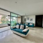 Centrally Located 3BR El Poblado Apartment – Nine Year Old Building With Open Kitchen, Amenities, and Large Balcony