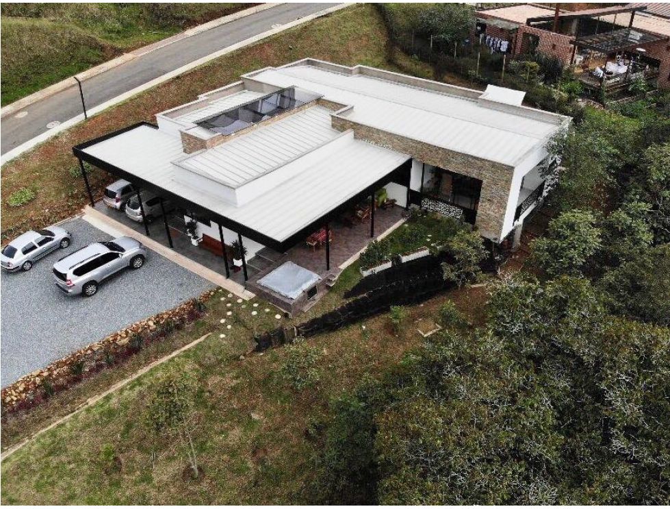 The Perfect Gated Community Home Just 20 Minutes From El Poblado – Floor-To-Ceiling Windows, Forest Views, and Relaxing Jacuzzi