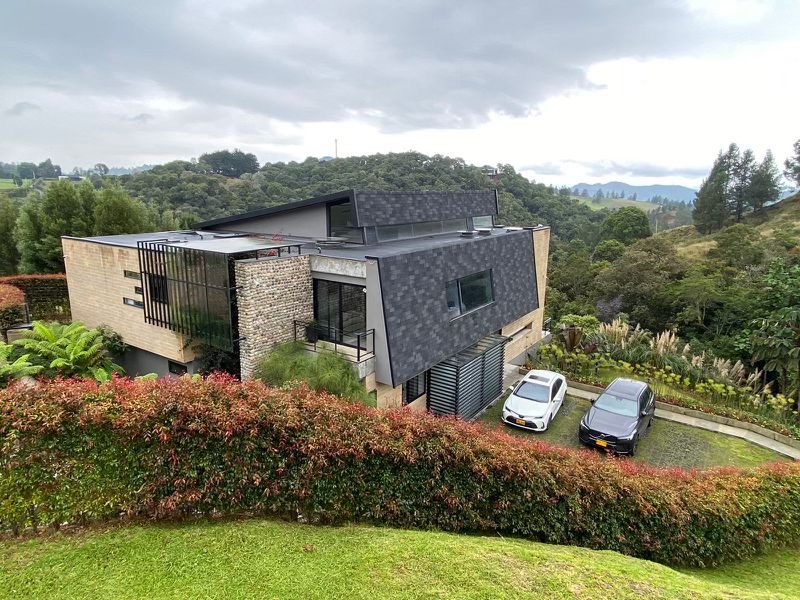 Four Bedroom Envigado Home With Cinema and Jacuzzi, Just 25 Minutes To The International Airport
