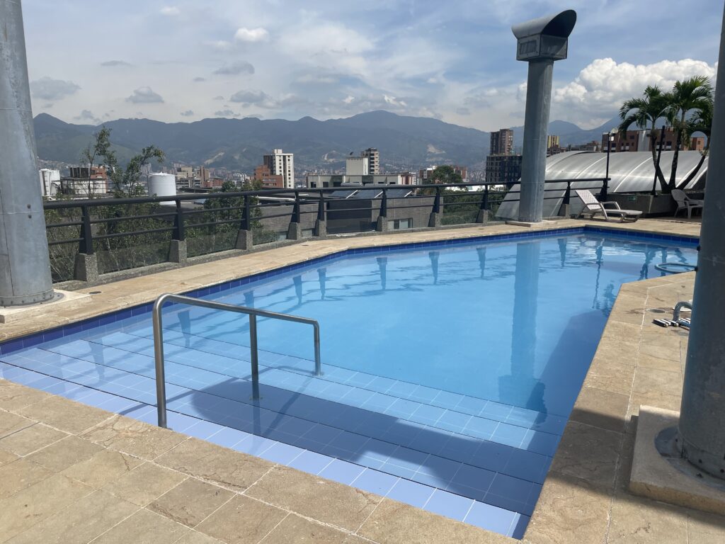 Distinctive Well Located El Poblado Renaissance Building Condo With Classic Styling & Compelling Rooftop Pool