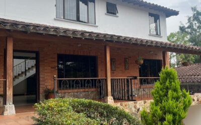 title Two-Level, 3BR El Poblado Gated Community Home With Open Spaces, Backyard Terrace, and High Ceilings