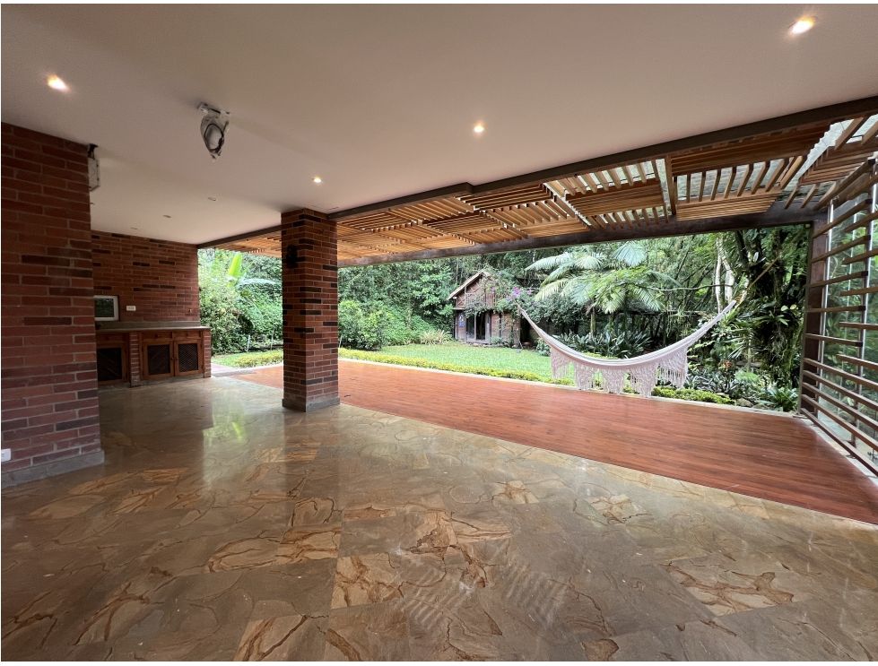 Two-Level El Poblado Gated Community Home With High Ceilings, Backyard Space, and Beautiful Hardwood and Marble Flooring