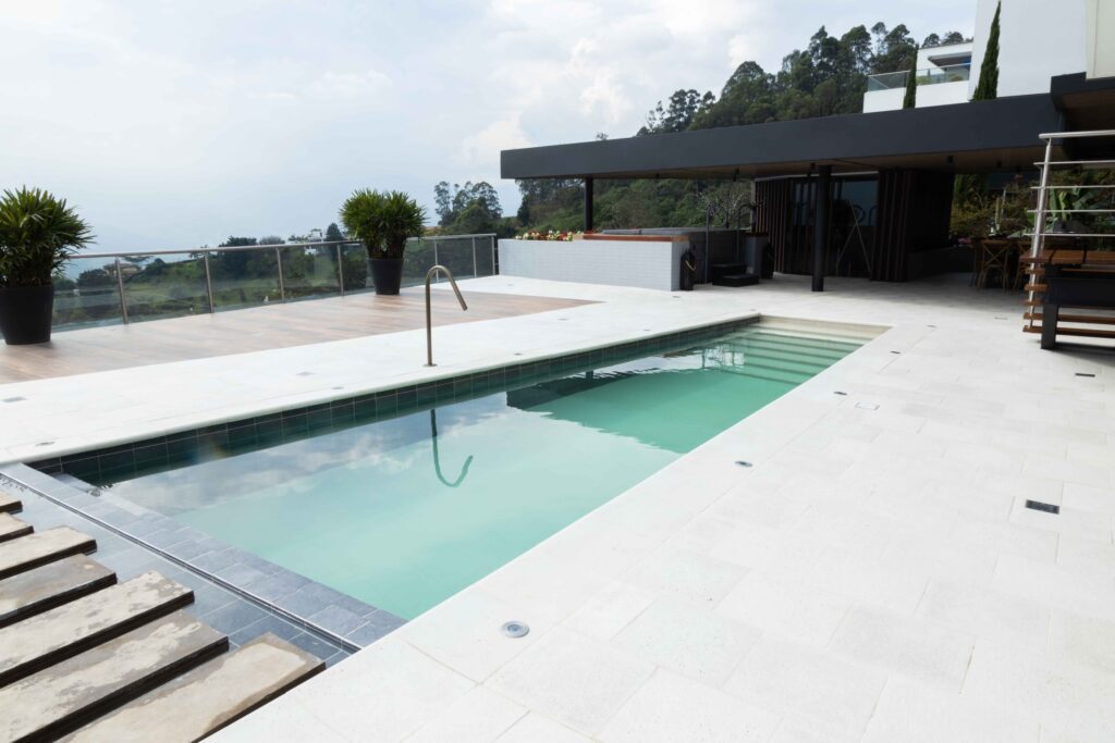 Luxury 5BR Modern Home in El Poblado with Private Pool Overlooking Medellin Mountains – Theater, Spa Amenities, and More